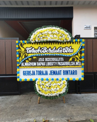 Papan Bunga Duka di Segedong